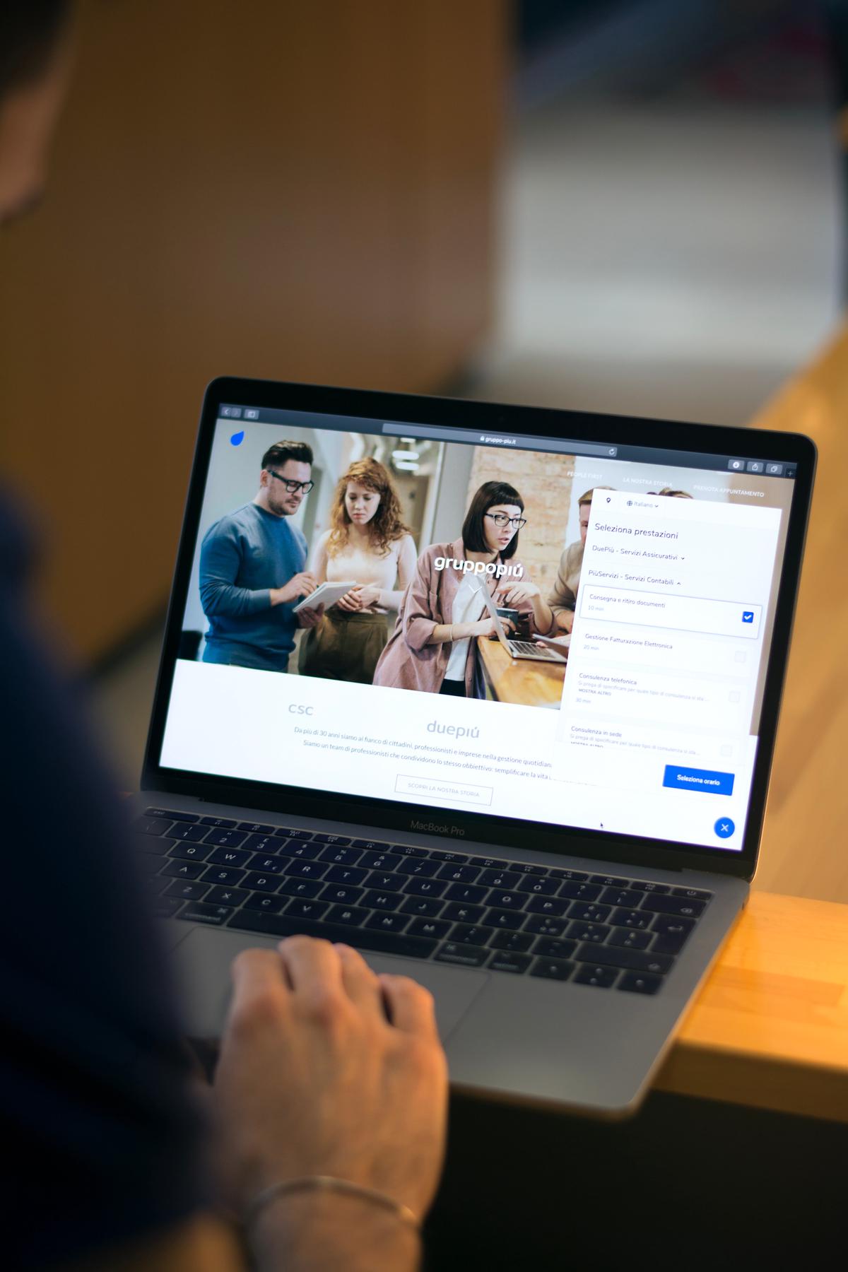 Image of a person browsing website design samples on a computer screen